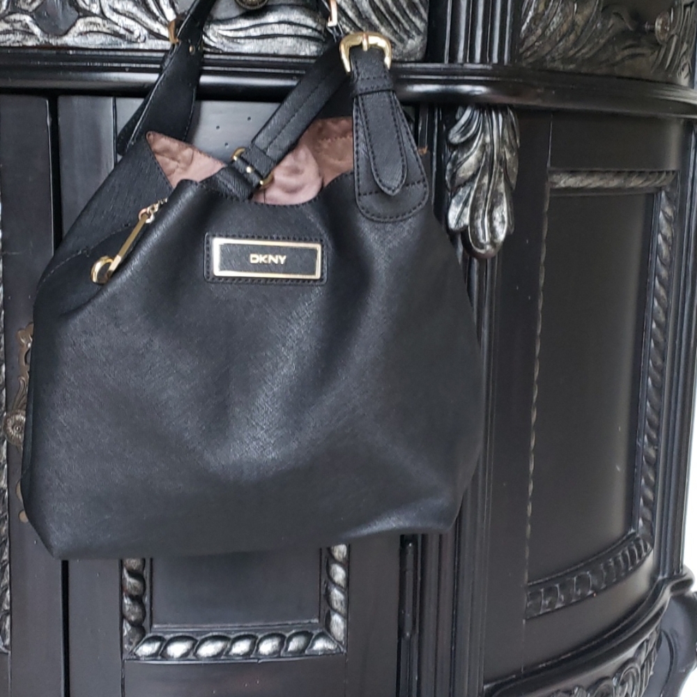 Firm black leather authentic  DKNY handbag